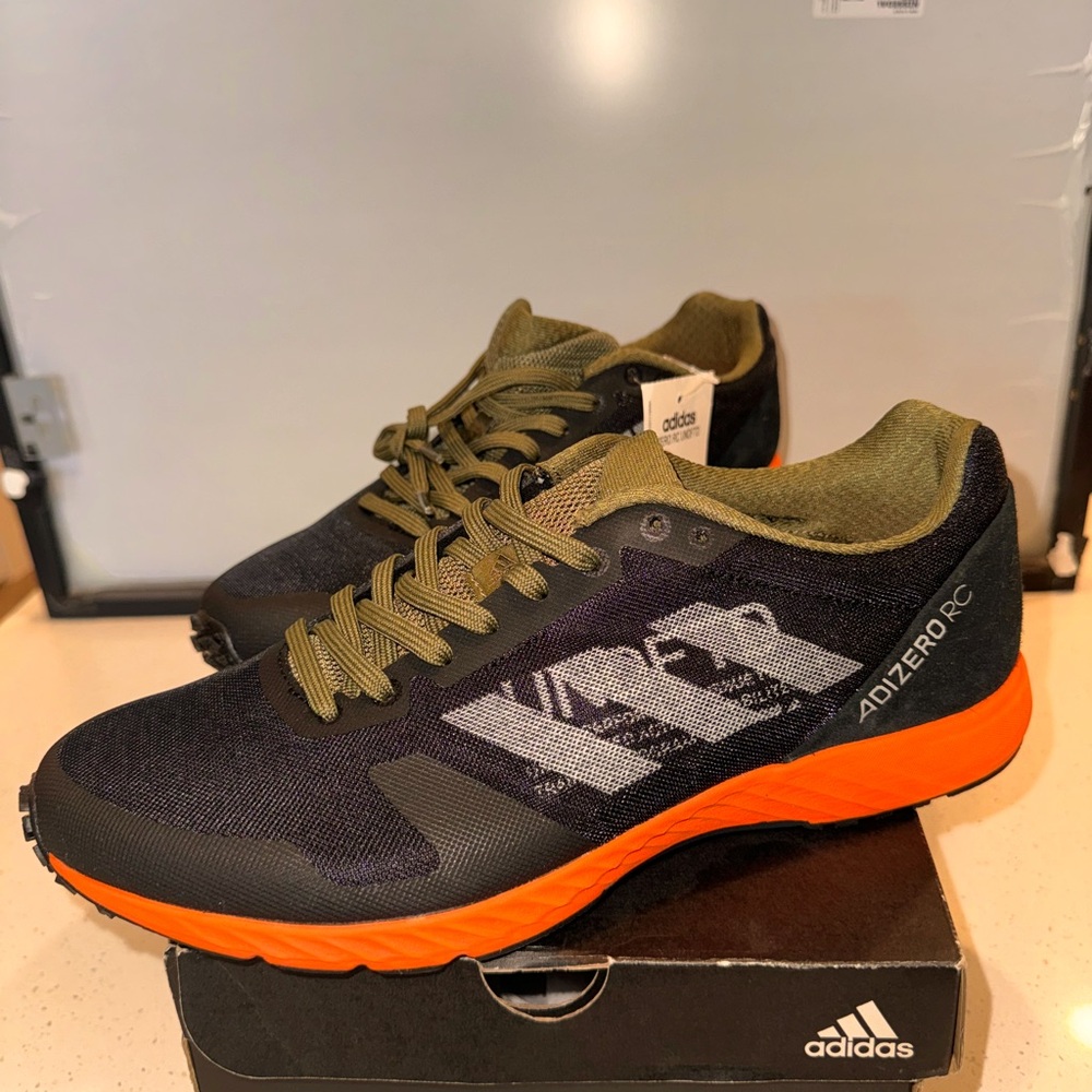 Undefeated x Adizero RC 'Black Orange' 9.5. Adidas- Brand New with box and tags
